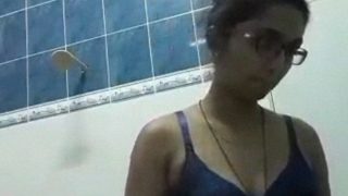 Tamil Nurse Sheds Uniform to Finger Her Hairy Pussy