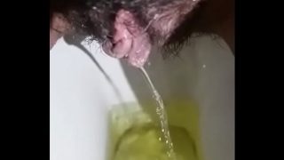 Desi babe unleashing a golden stream