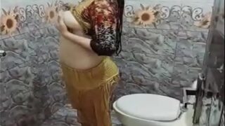 Plump Pakistani beauty pleasures herself under the steamy shower spray