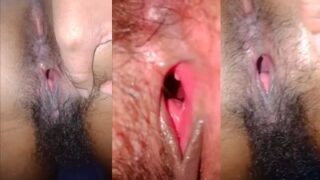 Watch this horny Indian milf spread her pussy wide open on camera