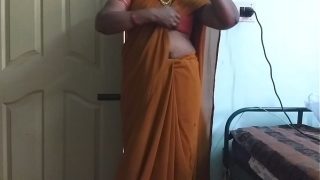 Sultry Desi Housewife in Saree Teasing with Big Tits and Shaved Pussy, Fingering Herself