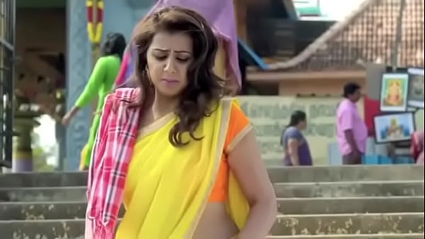 Tamil actress Nikki Kalrani showing off her huge tits and juicy curves.