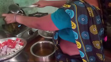 Indian housewife gets naughty with boyfriend while cooking, hot kitchen action.