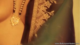 Watch this Indian beauty move her hips like a wild fantasy, dripping with forbidden desire and raw passion.