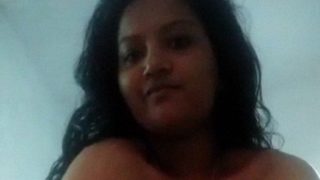 Watch a hot Malayali woman strip completely naked