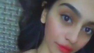 Watch this hot Indian babe strip down and play dirty